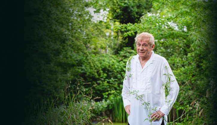 Eric's Pride and Prejudice promotional image with actor David Graham emerging from a pond with weeds stuck to his shirt. Credit Malcolm Hart.