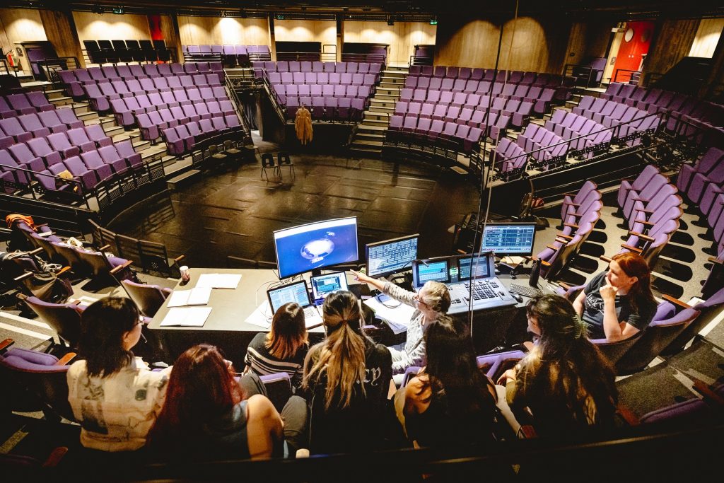 Kiln Sparks participants explore how to control lighting design and audio visual elements on stage. Credit Andrew Billington