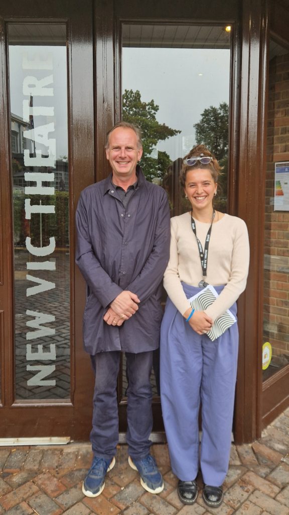 One of the 37 Plays 18+ category winners, Tim Wallers from Ludlow, with New Vic Assistant Director Polly Wain outside the New Vic Theatre